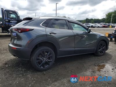 Trzecie zdjęcie samochodu z tyłu: 2024 MAZDA CX-30 SELECT VIN:3MVDMBBMXRM601040 - miniatura