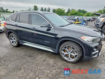Czwarte zdjęcie samochodu z boku: 2018 BMW X1 XDRIVE28I VIN:WBXHT3C39J5L25691 - miniatura