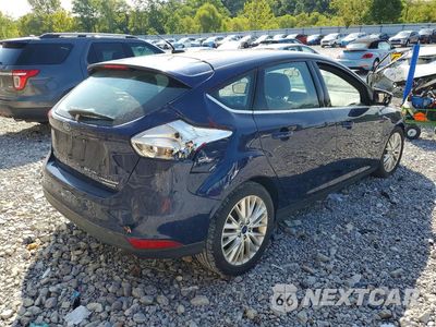 Trzecie zdjęcie samochodu z tyłu: 2016 FORD FOCUS TITANIUM VIN:1FADP3N21GL336070 - miniatura