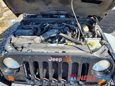 Zdjęcie 11 z 12 samochodu: 2011 JEEP WRANGLER UNLIMITED RUBICON VIN:1J4BA6H17BL593471 - miniatura