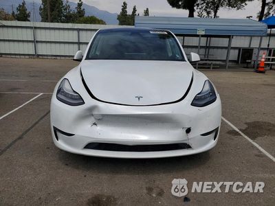 Piąte zdjęcie samochodu w środku: 2023 TESLA MODEL Y VIN:7SAYGDEE4PA112404 - miniatura