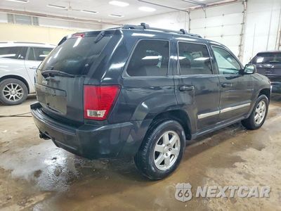 Trzecie zdjęcie samochodu z tyłu: 2010 JEEP GRAND CHEROKEE LAREDO VIN:1J4PR4GK9AC120733 - miniatura