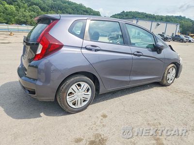 Trzecie zdjęcie samochodu z tyłu: 2019 HONDA FIT LX VIN:3HGGK5H4XKM701255 - miniatura