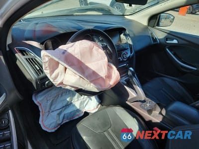 Zdjęcie 8 z 12 samochodu: 2013 FORD FOCUS TITANIUM VIN:1FADP3J25DL263593 - miniatura