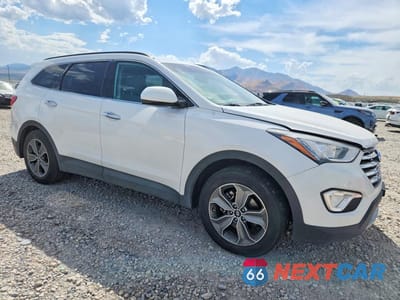 Czwarte zdjęcie samochodu z boku: 2016 HYUNDAI SANTA FE SE VIN:KM8SM4HFXGU155053 - miniatura