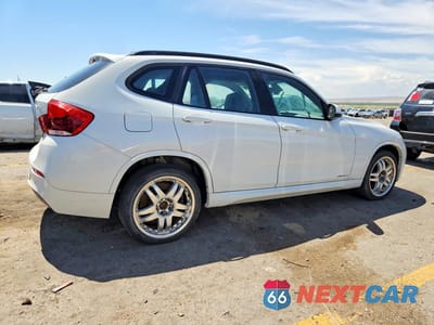 Trzecie zdjęcie samochodu z tyłu: 2013 BMW X1 XDRIVE35I VIN:WBAVM5C51DVV89144 - miniatura