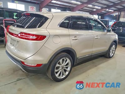 Trzecie zdjęcie samochodu z tyłu: 2017 LINCOLN MKC SELECT VIN:5LMCJ2D95HUL62174 - miniatura