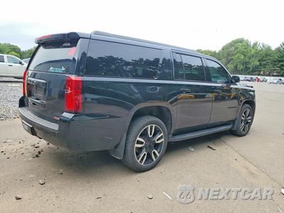 Trzecie zdjęcie samochodu z tyłu: 2020 CHEVROLET SUBURBAN K1500 LT VIN:1GNSKHKC5LR226275 - miniatura