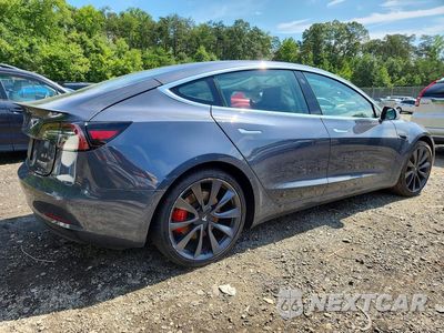 Trzecie zdjęcie samochodu z tyłu: 2020 TESLA MODEL 3 VIN:5YJ3E1EC9LF640897 - miniatura
