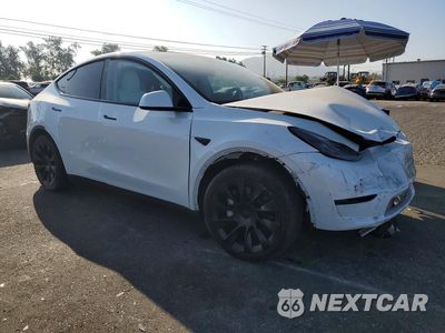 Czwarte zdjęcie samochodu z boku: 2023 TESLA MODEL Y VIN:7SAYGDED0PF979261 - miniatura