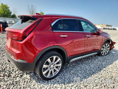 Trzecie zdjęcie samochodu z tyłu: 2021 CADILLAC XT4 PREMIUM LUXURY VIN:1GYFZDR48MF039039 - miniatura