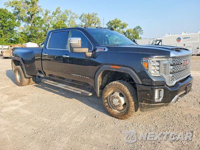Czwarte zdjęcie samochodu z boku: 2020 GMC SIERRA K3500 DENALI VIN:1GT49WEY1LF314041 - miniatura