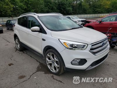 Czwarte zdjęcie samochodu z boku: 2017 FORD ESCAPE TITANIUM VIN:1FMCU9J98HUE21600 - miniatura