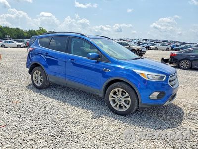 Czwarte zdjęcie samochodu z boku: 2018 FORD ESCAPE SE VIN:1FMCU0GD2JUC32597 - miniatura