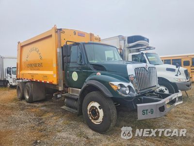 Czwarte zdjęcie samochodu z boku: 2016 INTERNATIONAL 7400 REFUSE TRUCK VIN:1HTWGAAT0GH192538 - miniatura