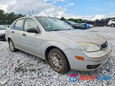 Czwarte zdjęcie samochodu z boku: 2007 FORD FOCUS ZX4 VIN:1FAFP34N27W244596 - miniatura