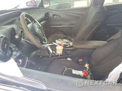 Zdjęcie 7 z 12 samochodu: 2021 TOYOTA PRIUS L ECO VIN:JTDKAMFU7M3146150 - miniatura