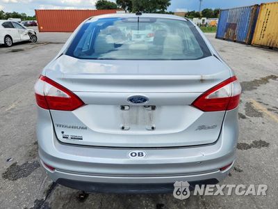 Zdjęcie 6 z 12 samochodu: 2014 FORD FIESTA TITANIUM VIN:3FADP4CJ8EM241713 - miniatura