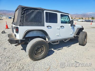 Trzecie zdjęcie samochodu z tyłu: 2015 JEEP WRANGLER UNLIMITED SPORT VIN:1C4BJWDG4FL641336 - miniatura