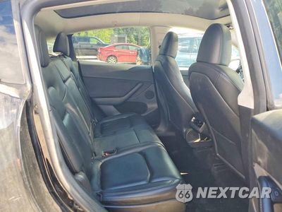 Zdjęcie 10 z 12 samochodu: 2023 TESLA MODEL Y VIN:7SAYGAEE6PF769013 - miniatura