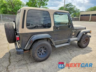 Trzecie zdjęcie samochodu z tyłu: 2000 JEEP WRANGLER / TJ SAHARA VIN:1J4FA59S6YP778745 - miniatura