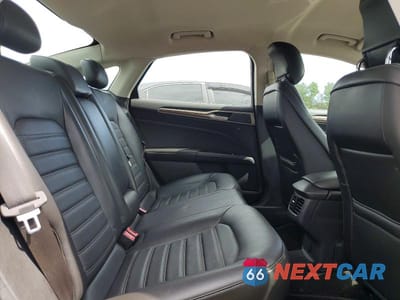 Zdjęcie 10 z 12 samochodu: 2013 FORD FUSION SE VIN:3FA6P0H94DR347061 - miniatura