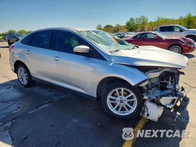 Czwarte zdjęcie samochodu z boku: 2016 FORD FOCUS SE VIN:1FADP3F28GL280479 - miniatura