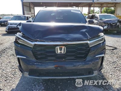 Piąte zdjęcie samochodu w środku: 2025 HONDA PILOT TOURING VIN:5FNYG1H70SB118463 - miniatura
