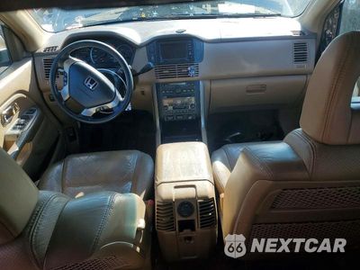 Zdjęcie 8 z 13 samochodu: 2004 HONDA PILOT EXL VIN:2HKYF18704H500774 - miniatura