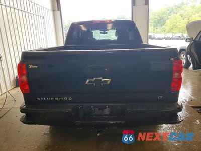 Zdjęcie 6 z 12 samochodu: 2017 CHEVROLET SILVERADO K1500 LT VIN:3GCUKREC3HG135371 - miniatura