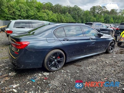 Trzecie zdjęcie samochodu z tyłu: 2018 BMW 750 I VIN:WBA7F0C59JGM22648 - miniatura