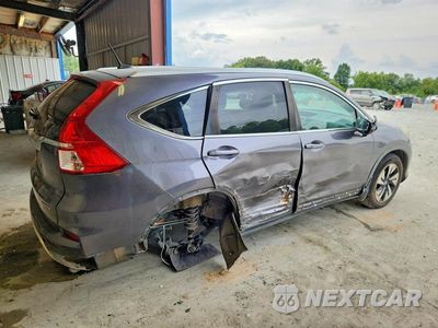 Trzecie zdjęcie samochodu z tyłu: 2016 HONDA CR-V TOURING VIN:5J6RM3H9XGL008769 - miniatura