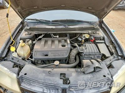 Zdjęcie 11 z 12 samochodu: 2009 DODGE AVENGER SE VIN:1B3LC46B79N552472 - miniatura