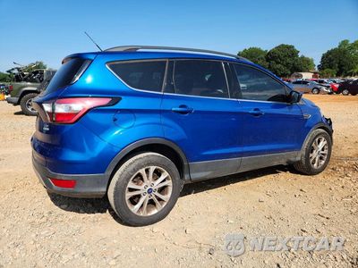 Trzecie zdjęcie samochodu z tyłu: 2017 FORD ESCAPE SE VIN:1FMCU0G91HUF02408 - miniatura