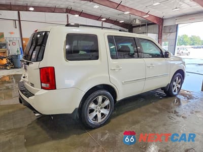 Trzecie zdjęcie samochodu z tyłu: 2015 HONDA PILOT TOURING VIN:5FNYF4H94FB044203 - miniatura