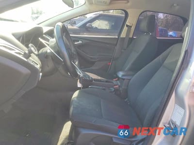 Zdjęcie 7 z 12 samochodu: 2018 FORD FOCUS SE VIN:1FADP3F27JL237470 - miniatura