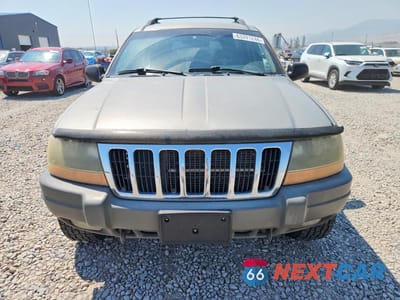 Piąte zdjęcie samochodu w środku: 2002 JEEP GRAND CHEROKEE LAREDO VIN:1J4GW48N12C183036 - miniatura