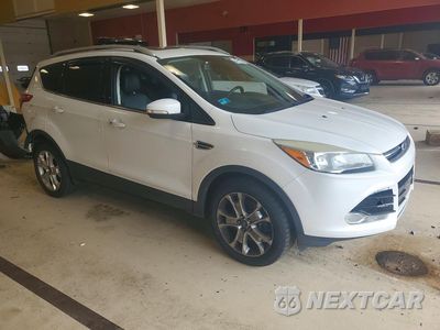 Czwarte zdjęcie samochodu z boku: 2014 FORD ESCAPE TITANIUM VIN:1FMCU9JX2EUC03484 - miniatura