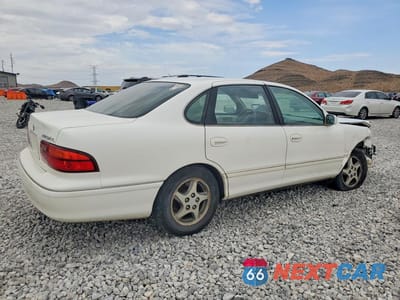 Trzecie zdjęcie samochodu z tyłu: 1999 TOYOTA AVALON XL VIN:4T1BF18B7XU327058 - miniatura