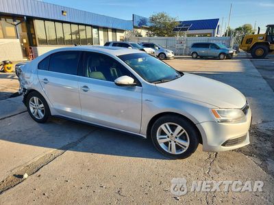Czwarte zdjęcie samochodu z boku: 2013 VOLKSWAGEN JETTA HYBRID VIN:3VW637AJ4DM272648 - miniatura
