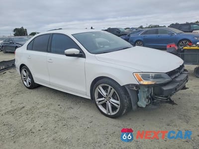 Czwarte zdjęcie samochodu z boku: 2012 VOLKSWAGEN JETTA SE VIN:3VWDP7AJ9CM374022 - miniatura