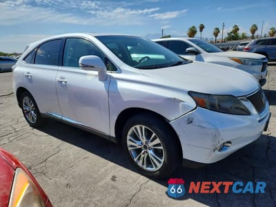 Czwarte zdjęcie samochodu z boku: 2010 LEXUS RX 450H VIN:JTJZB1BA4A2003144 - miniatura