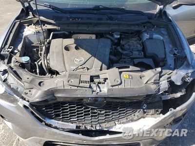 Zdjęcie 11 z 12 samochodu: 2014 MAZDA CX-5 TOURING VIN:JM3KE2CY3E0369098 - miniatura