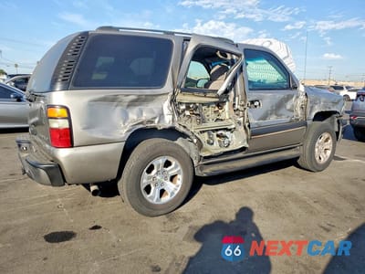 Trzecie zdjęcie samochodu z tyłu: 2003 CHEVROLET TAHOE C1500 VIN:1GNEC13VX3R121698 - miniatura