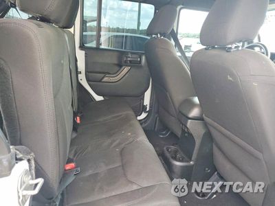 Zdjęcie 10 z 12 samochodu: 2016 JEEP WRANGLER UNLIMITED SPORT VIN:1C4BJWDG8GL328114 - miniatura