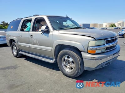 Czwarte zdjęcie samochodu z boku: 2003 CHEVROLET SUBURBAN K1500 VIN:3GNFK16T23G184652 - miniatura