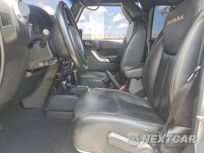 Zdjęcie 7 z 14 samochodu: 2015 JEEP WRANGLER UNLIMITED SAHARA VIN:1C4BJWEG0FL537960 - miniatura
