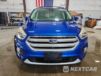 Piąte zdjęcie samochodu w środku: 2017 FORD ESCAPE TITANIUM VIN:1FMCU0JD0HUE54364 - miniatura