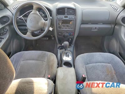 Zdjęcie 8 z 13 samochodu: 2004 HYUNDAI SANTA FE GLS VIN:KM8SC13DX4U769409 - miniatura
