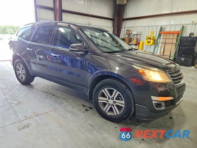 Czwarte zdjęcie samochodu z boku: 2016 CHEVROLET TRAVERSE LT VIN:1GNKRGKDXGJ269951 - miniatura